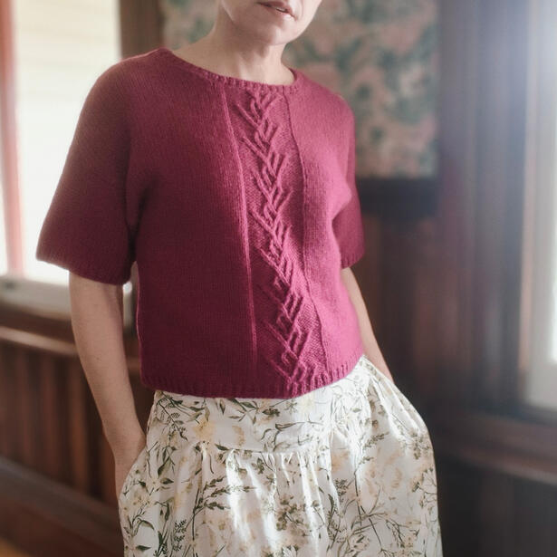 Women wearing knitted tee in heritage building